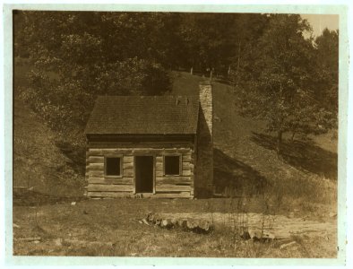 Abandoned log cabin on the hillside. Not many used now but it was the only kind used a while ago. Near Sunset School, Pocahontas Co., W. Va. LOC nclc.04412 photo