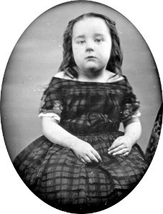 Anne Dudley Roberts, three-quarter length portrait, facing front, as a girl, cropped