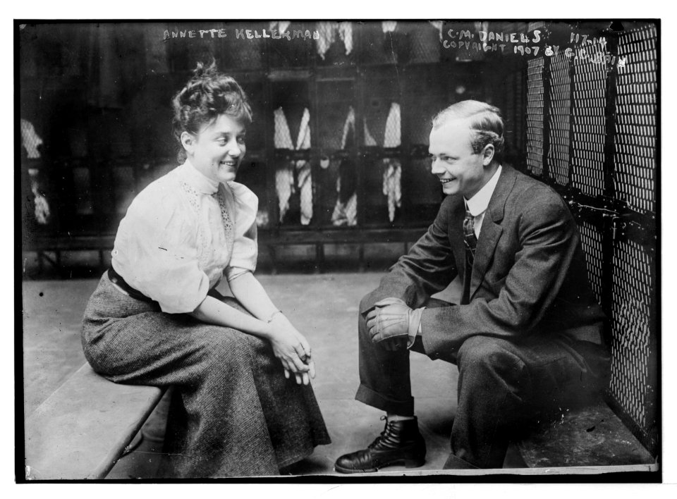 Annette Kellerman and C.M. Daniels, seated, talking LCCN2014680675
