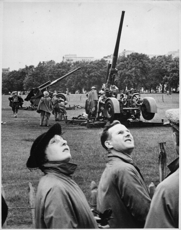 Anti-aircraft guns in Hyde Park go into action as enemy bombers make a daylight raid on London, during giant air... - NARA - 541897