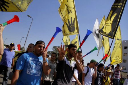 Anti-coup protesters with R4bia sign in Nasr City-Cairo 11-Oct-2013