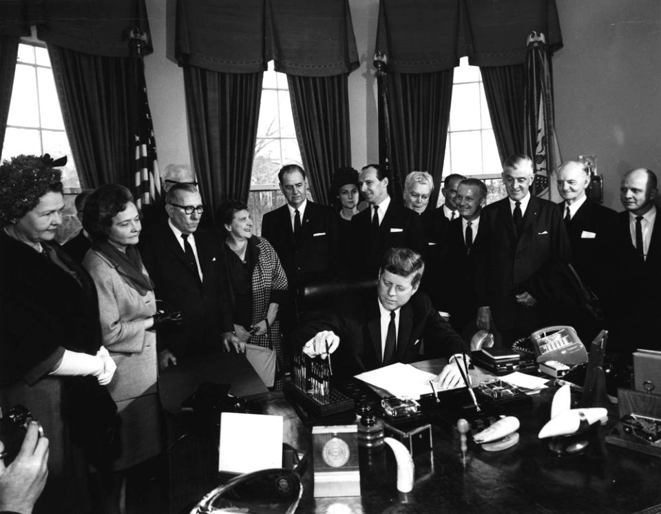 AR7813-A. President John F. Kennedy Signs Proclamation Declaring Sir Winston Churchill an Honorary Citizen of the United States