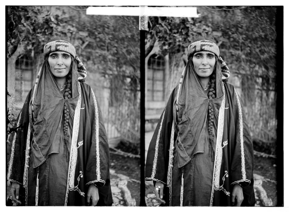 Arab woman wearing embroidered coat LOC matpc.04643