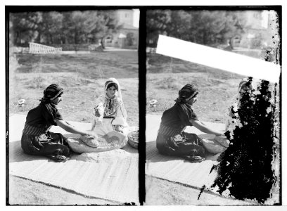 Arab women working primitive grain mill LOC matpc.06019