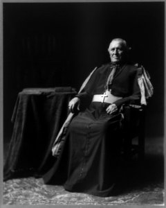 Archbishop John Ireland, 1838-1918, full-length portrait, seated, facing left LCCN2005685760