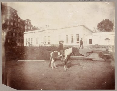 Archie Roosevelt, full-length portrait, on his calico Shetland pony Algonquin, facing right; in front of the new White House offices LCCN97502211