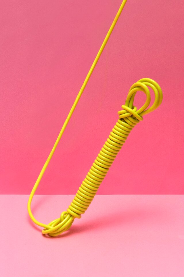 Yellow wire pink background