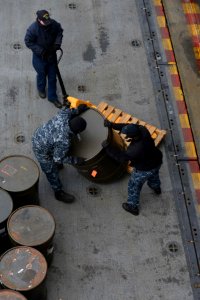 BAT weapons offload 141211-N-HO612-011