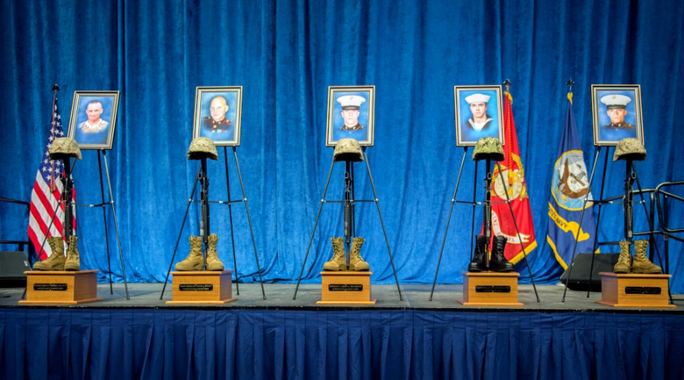 Battle crosses for fallen service members on stage during the memorial at McKenzie Arena at the University of Tennessee Chattanooga. (19979837504)