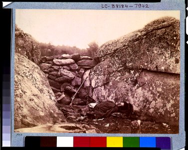 Battle-field of Gettysburg-Dead Confederate sharpshooter at foot of Little Round Top (i.e., Devil's Den) LCCN91732531