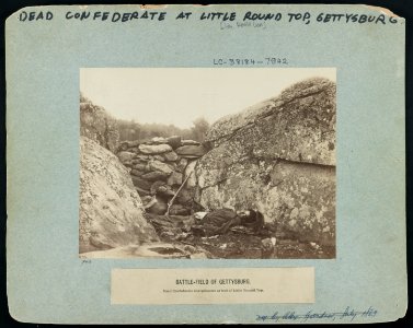 Battle-field of Gettysburg-Dead Confederate sharpshooter at foot of Little Round Top (i.e., Devil's Den) LCCN91732531