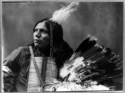 Battle, no. 2, half-length portrait, facing left; holding feather headdress LCCN92509998