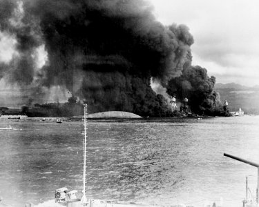 Battleship row ablaze from south 1941 photo