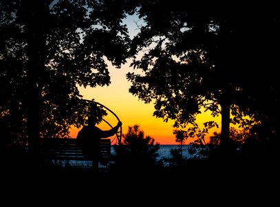 Man bench swing photo