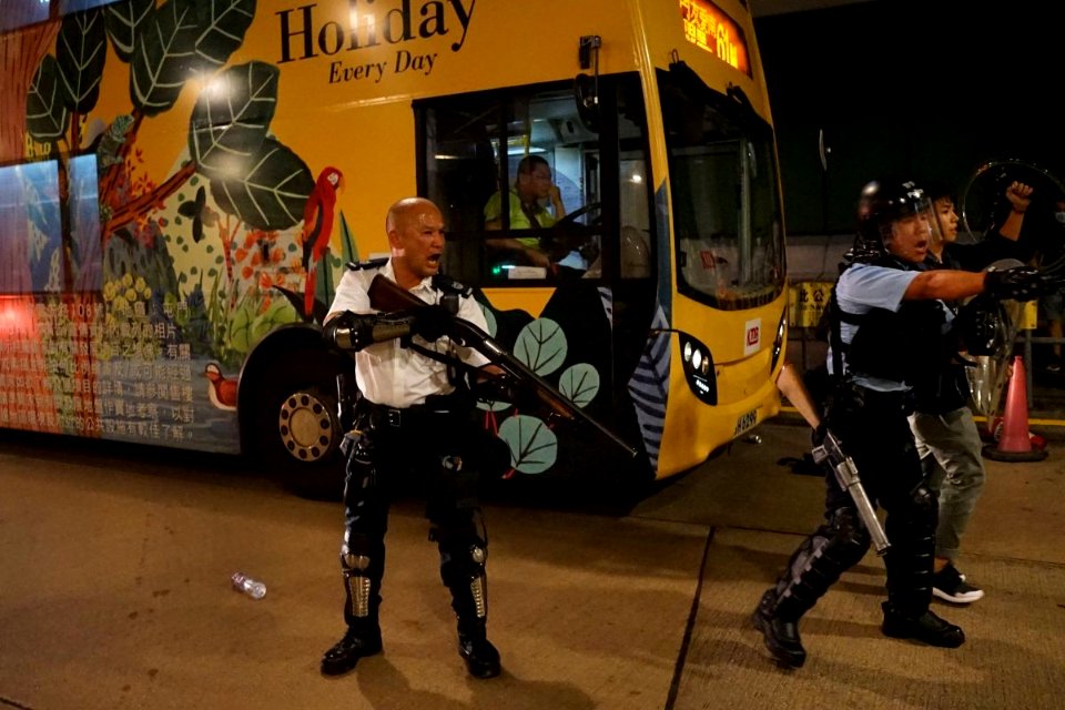 Police force prepare gun in Kwai Fong Station Bus Terminal 2