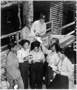 A contingent of 15 nurses...arrive in the southwest Pacific area, received their first batch of home mail at their sta - NARA - 531410 photo