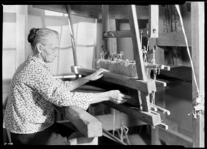 Another view of Aunt Lizzie Reagan weaving old-fashioned jean at the Pi Beta Phi school, Gatlinburg, Tennessee. This... - NARA - 532773 photo