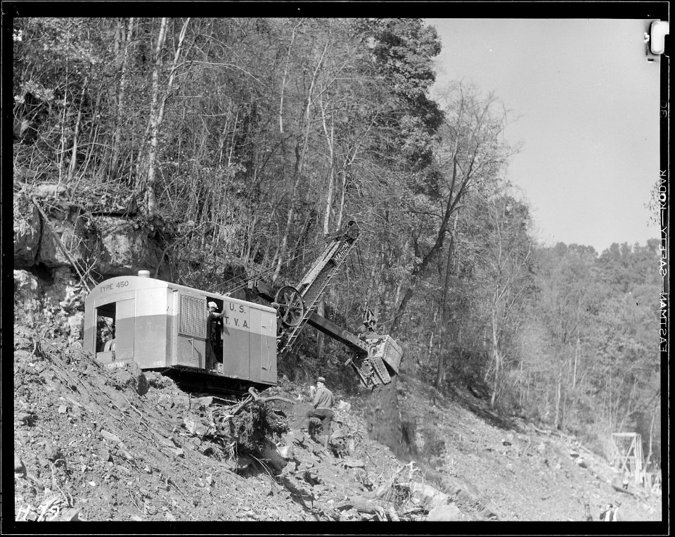 Another view of power shovel making roadway on hillside at Norris Dam site. - NARA - 532703