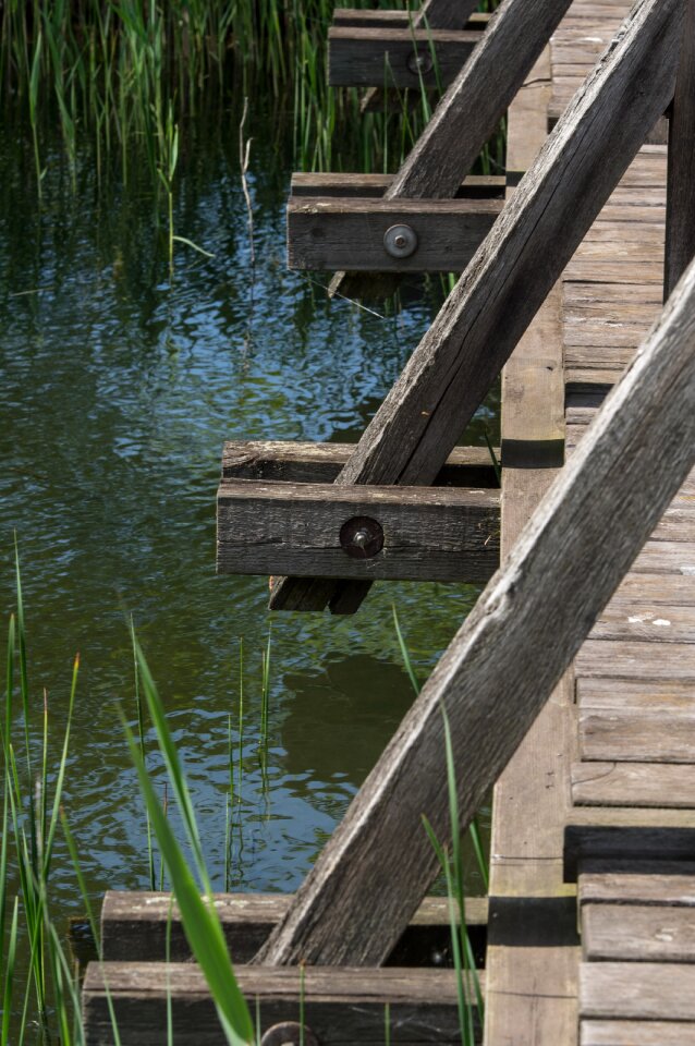 Wooden construction river reflection