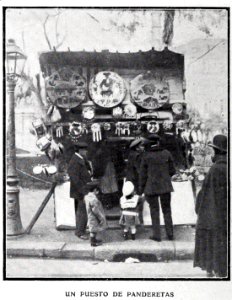 1907-12-28, Blanco y Negro, El comercio callejero en las Pascuas, Goñi (cropped) Un puesto de panderetas