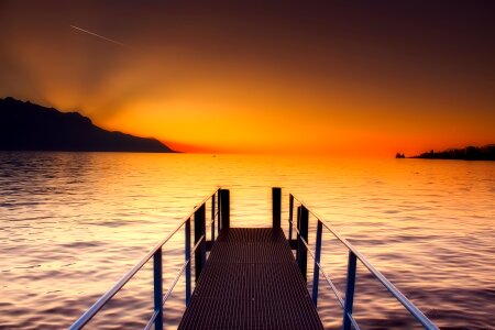 Dock silhouette sunset photo