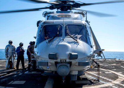 190909-N-UB406-0063 Sailors aboard the guided-missile destroyer USS Gridley (DDG 101) conduct flight operations with an NH90 helicopter from the Royal Netherlands navy frigate HNLMS Van Speijk (F 828)