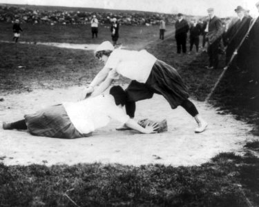 1913 Detail, Baseball - New York Female Giants- Miss Schnall, catcher, and Miss Slachu with hands on home plate LCCN2004679530 (cropped) (cropped)