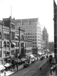 1st Ave, looking south, near the Sullivan Building between Columbia St and Cherry St, Seattle, ca 1900 (WARNER 625) photo