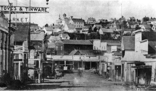 1st Ave S looking north from Main St, Seattle, ca 1875 (CURTIS 2072)