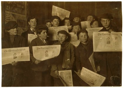 2 A.M. February 12,1908. Papers just out. Boys starting out on morning round. Ages 13 years and upward. At the side door of Journal Building near Brooklyn Bridge. LOC cph.3b01716