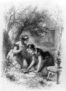 2 girls burying plate in ground LCCN2005679953
