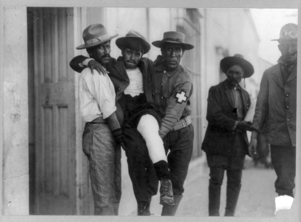 2 medics carrying wounded Mexican insurgent LCCN2006686978