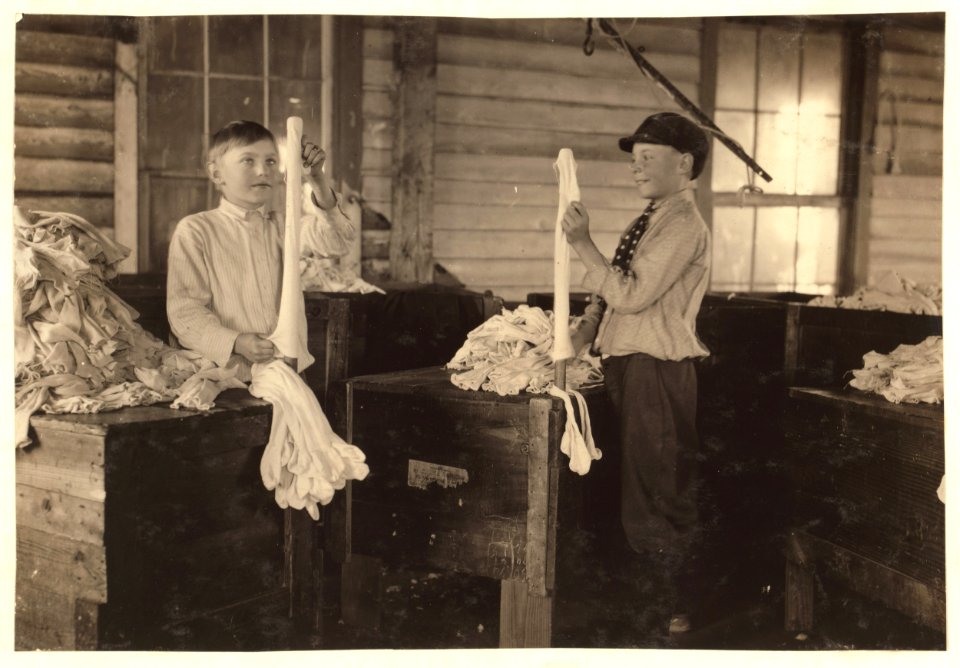 2 of the youngest turners at work. The boy on the right is Joseph Allsbrook. Said he was 11 years old and been working steady for 3 months. Crescent Hosiery Mill. LOC nclc.02946