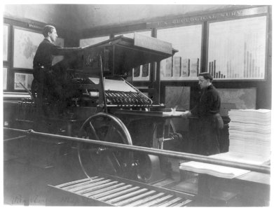 2 men operating map printing press at U.S. Geol. Survey LCCN2007677240