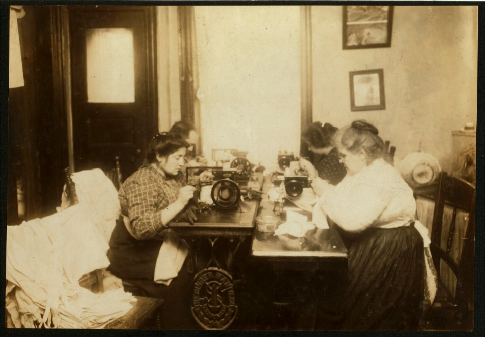 2 P.M. Workers on gloves, crowded into a small kitchen (photograph very inadequately represents congestion). Dallavalla, 50 McDougal St. LOC nclc.04126