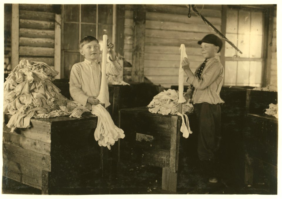 2 of the youngest turners at work. The boy on the right is Joseph Allsbrook. Said he was 11 years old and been working steady for 3 months. Crescent Hosiery Mills. LOC nclc.02965