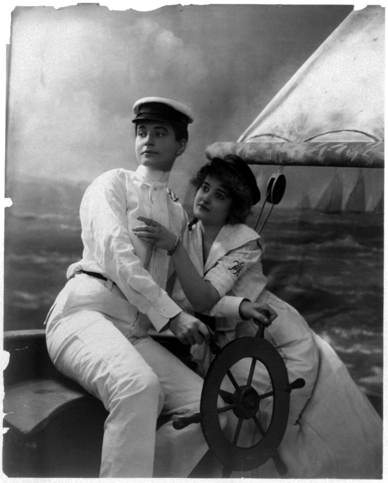 2 women, one in man's clothing, on sailboat LCCN2003675190