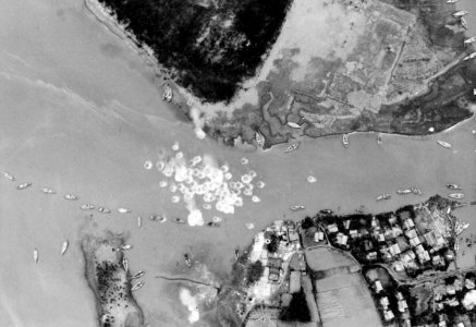 20 mm shells from a A-4E Skyhawk of VA-55 hit barges in Vietnam on 20 July 1966