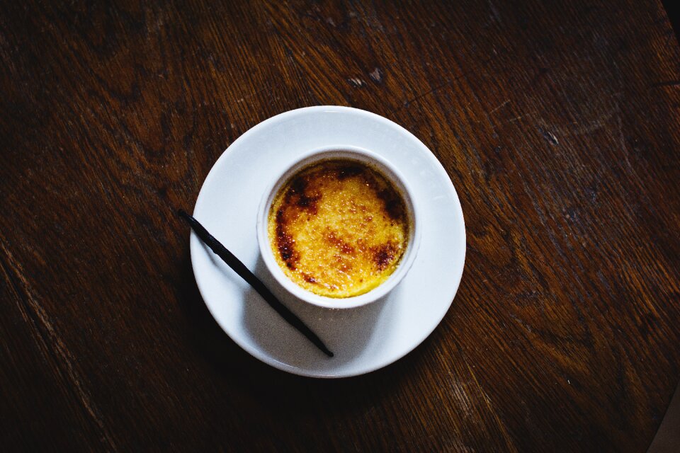 Creme brulee dark dessert photo