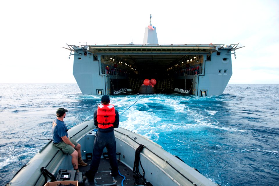 Orion capsule guided into well deck of USS Anchorage after EFT-1