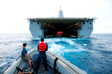 Orion capsule guided into well deck of USS Anchorage after EFT-1