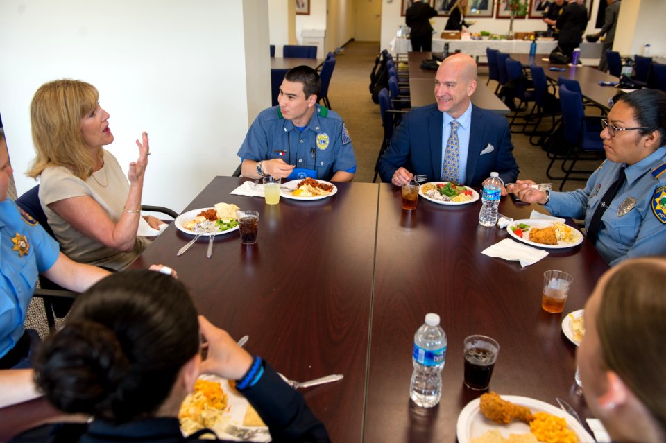 2015 Law Enforcement Explorers Conference a woman speaks during a meal