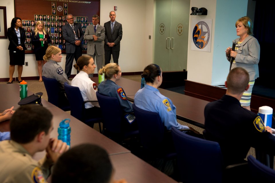 2015 Law Enforcement Explorers Conference woman in suit speaks to explorers