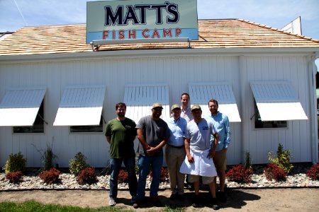 2016-06-16 Senator Coons visits Lewes, DE for the grand opening of Matt's Fish Camp (27637067411)