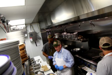 2016-06-16 Senator Coons visits Lewes, DE for the grand opening of Matt's Fish Camp (27637133731)