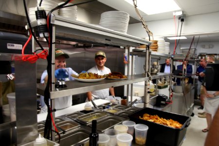 2016-06-16 Senator Coons visits Lewes, DE for the grand opening of Matt's Fish Camp (27677885156)