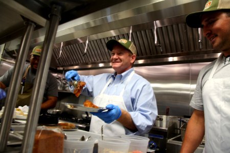 2016-06-16 Senator Coons visits Lewes, DE for the grand opening of Matt's Fish Camp (27099578694)