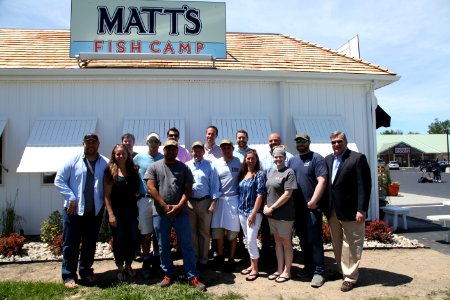 2016-06-16 Senator Coons visits Lewes, DE for the grand opening of Matt's Fish Camp (27101317943)