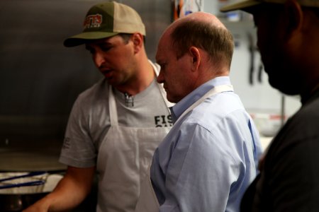 2016-06-16 Senator Coons visits Lewes, DE for the grand opening of Matt's Fish Camp (27433570230)