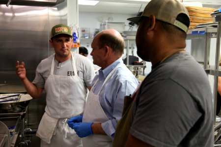 2016-06-16 Senator Coons visits Lewes, DE for the grand opening of Matt's Fish Camp (27099636954)